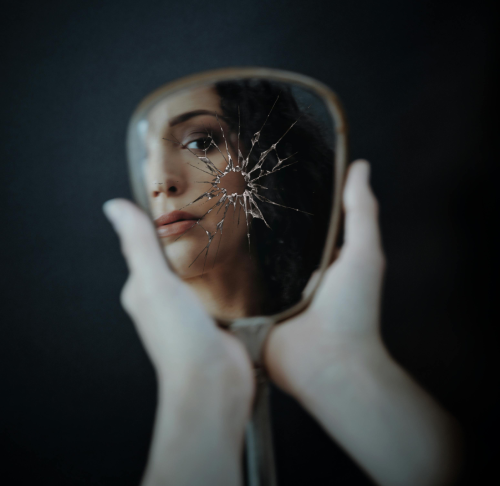 person holding white printer paper